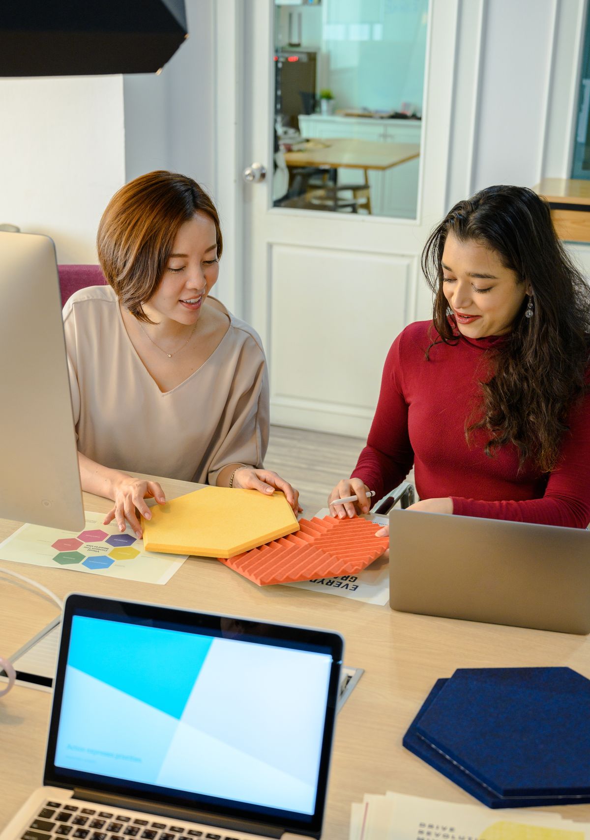 A senior professional at work in a modern office